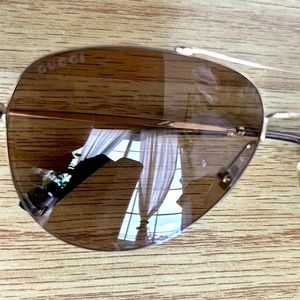 100% authentic Gucci sunglasses.  Worn once.  Excellent condition.  No case